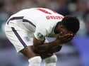 Marcus Rashford reacts after missing his penalty