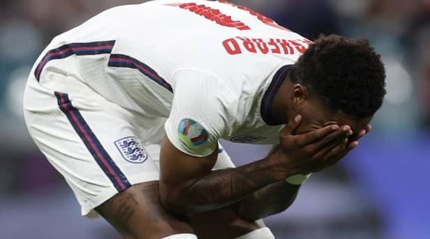 Marcus Rashford reacts after missing his penalty