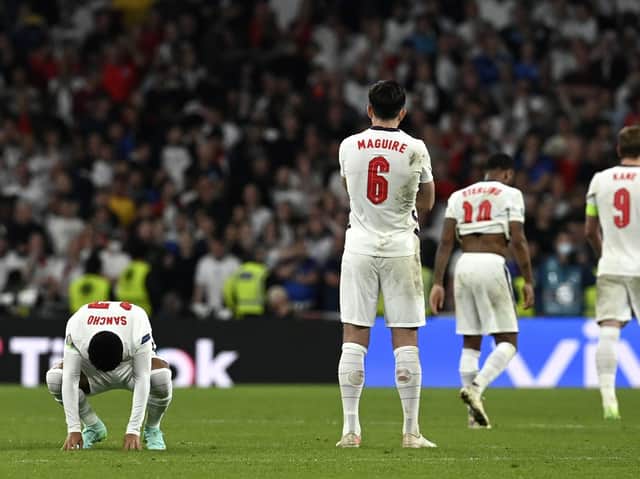 England's dejected players at the end of the Euro 2020 final at Wembley
