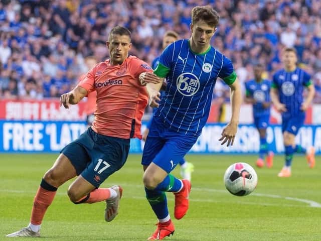 Jensen Weir in action for Latics against Everton