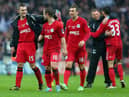 Callum McManaman celebrates reaching the FA Cup final in 2013 with, among others, Graeme Jones