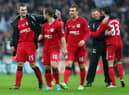 Callum McManaman celebrates reaching the FA Cup final in 2013 with, among others, Graeme Jones