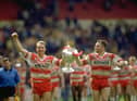 3 May 1992:  Dean Bell (left) and Martin Dermot of Wigan celebrate with the trophy after the Challenge Cup final against Castleford at Wembley Stadium in London. Wigan won the match 28-12.