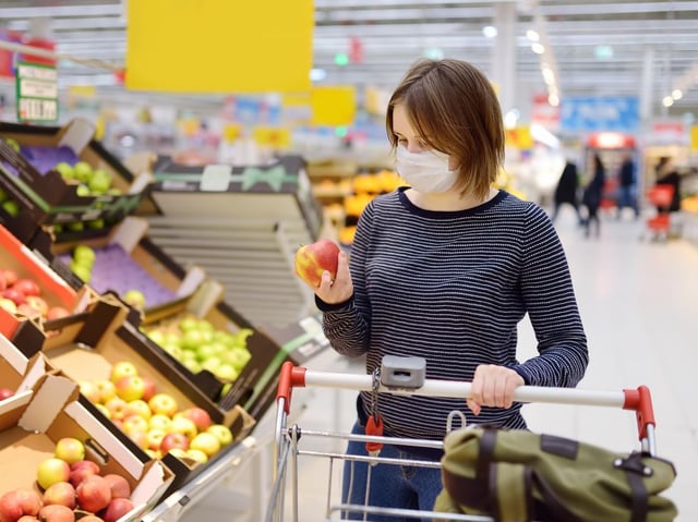 A shopper wearing a mask