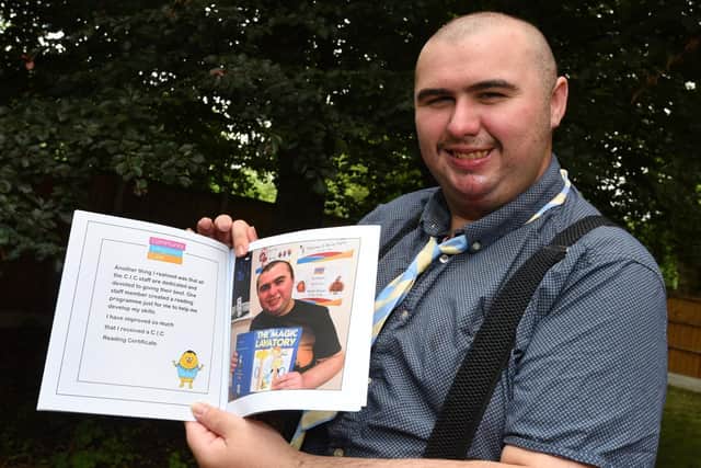 David Clarke a resident at Hyndelle Lodge supported living, Hindley, was struggling with reading but with the help of staff he has now written a book