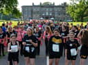Runners and walkers set off outside Haigh Hall