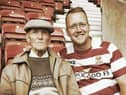 Albert and Tim Liptrot at the DW Stadium and, below, Andrew Duxbury and Tim Liptrot are cycling 100 miles from Wolverhampton to Wigan for charity