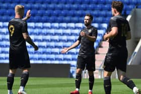 Gwion Edwards scored Latics' first goal of pre-season inside eight minutes at Oldham