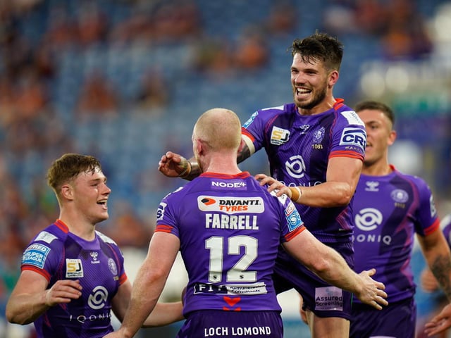 Liam Farrell is congratulated for his second-half try