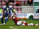 Emeka Obi in action for Latics last season against Northampton