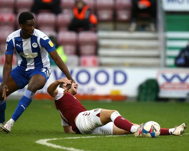 Emeka Obi in action for Latics last season against Northampton