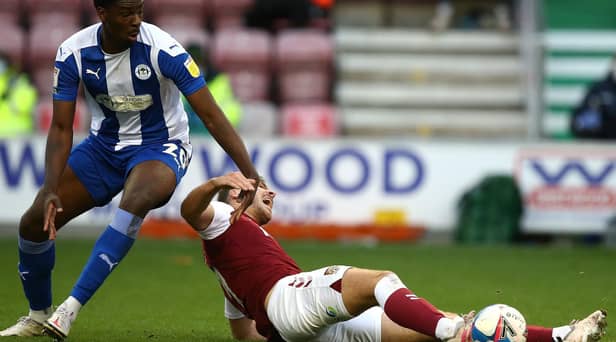 Emeka Obi in action for Latics last season against Northampton
