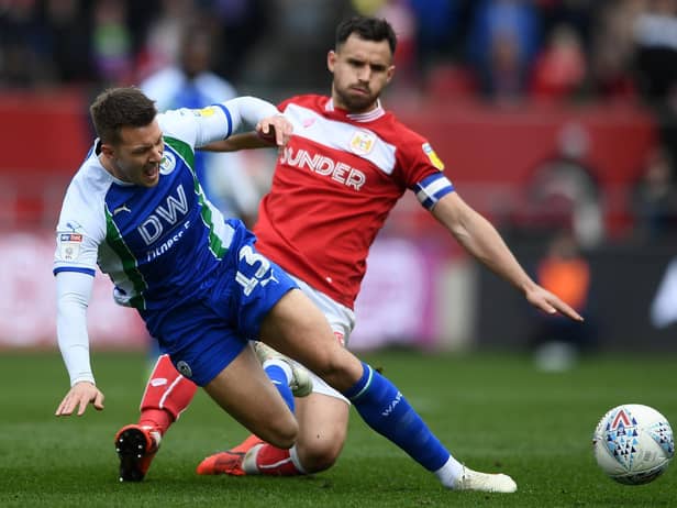 Bailey Wright in action against Latics during his Bristol City days