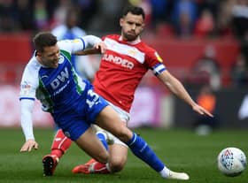 Bailey Wright in action against Latics during his Bristol City days