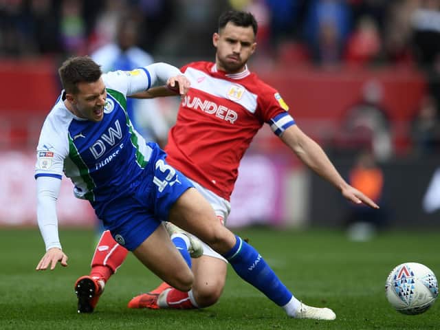 Bailey Wright in action against Latics during his Bristol City days