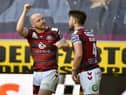 Jake Bibby celebrates scoring one of three tries on the night.
