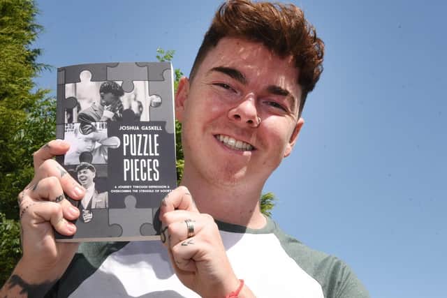 Josh Gaskell with his book Puzzle Pieces