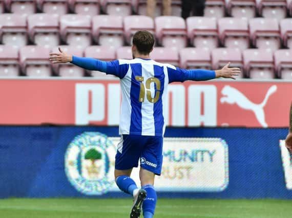 Callum Lang celebrates opening the scoring against Stoke