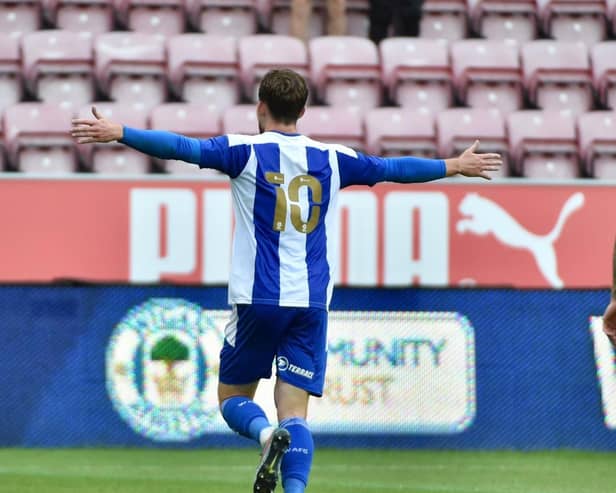 Callum Lang celebrates opening the scoring against Stoke