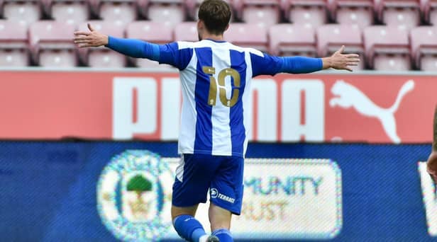 Callum Lang celebrates opening the scoring against Stoke