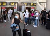 Tourists arrive at Son Sant Joan airport in Palma de Mallorca on June 28, 2021