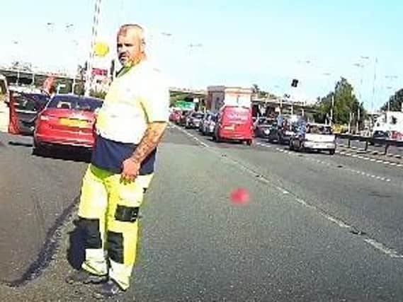 Police have issued an image of a man who may have information following a road traffic collision and theft in Haydock