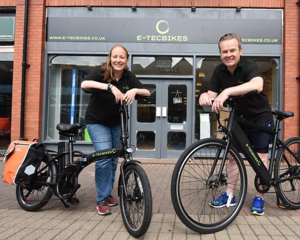 Lindsay and Marcus Pollard outside their new Wigan shop E-Tec Bikes