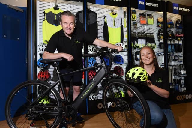 Marcus and Lindsay Pollard in their new store E-Tec Bikes in The Galleries