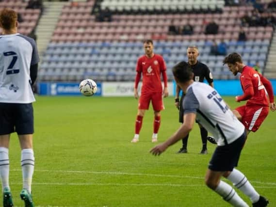 Callum Lang curls home what proved to be the winning goal against Preston