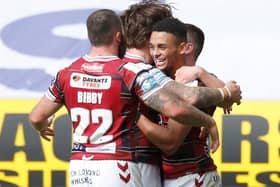 Wigan Warriors celebrate a try