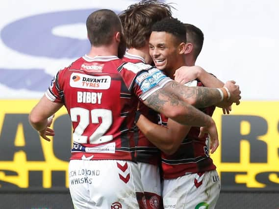 Wigan Warriors celebrate a try