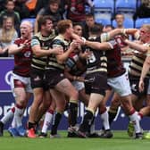 The Wigan-Leigh derby included an early brawl