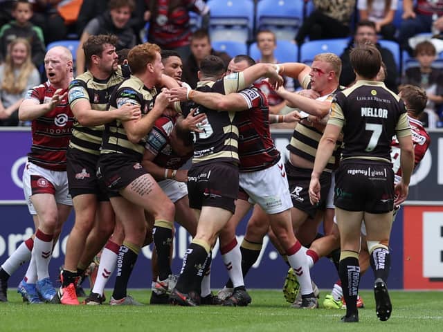 The Wigan-Leigh derby included an early brawl