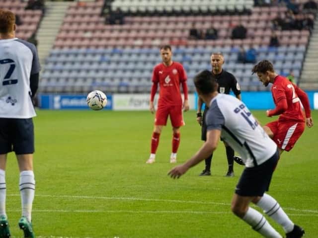 Callum Lang curls in a brilliant free-kick against Preston