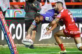 Jake Bibby goes over for Wigan's first try