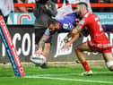 Jake Bibby goes over for Wigan's first try