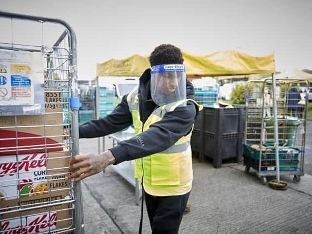 Manchester United star Marcus Rashford helps out at a local foodbank