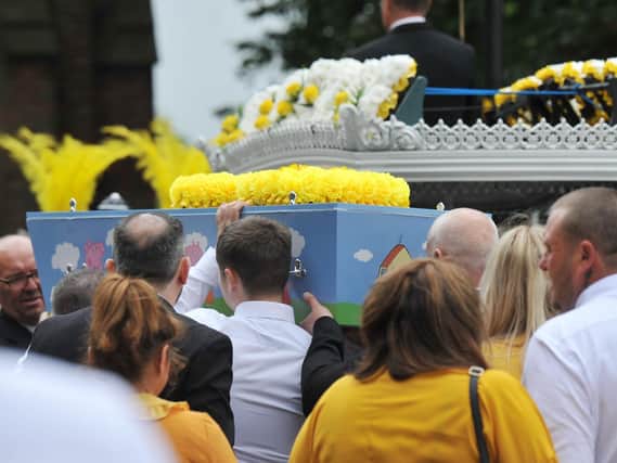 The coffin was decorated with Peppa Pig