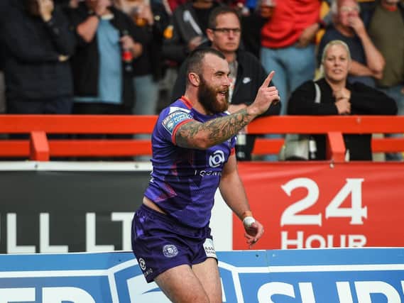 Jake Bibby celebrates his 12th try of the Super League campaign
