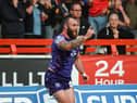 Jake Bibby celebrates his 12th try of the Super League campaign