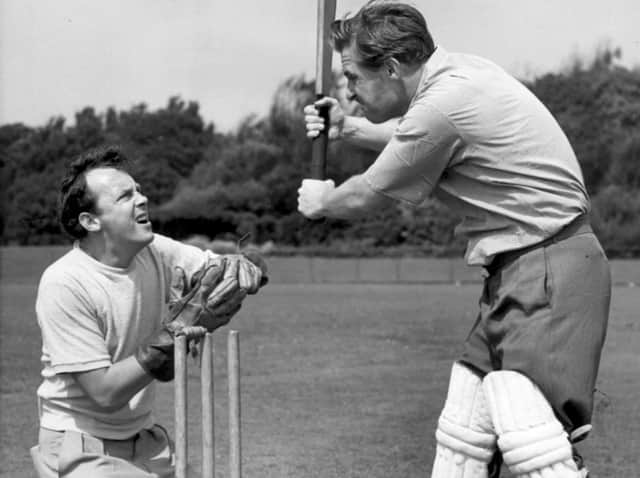 Eric Morecambe and Ernie Wise on the wicket at Stanley Park, Blackpool, in 1957