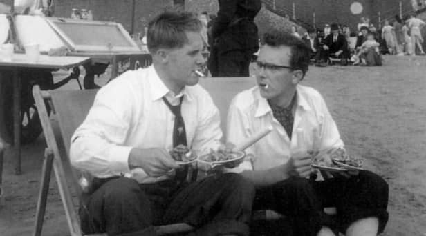 Eric Morecambe and Ernie Wise on the beach at Blackpool in 1953