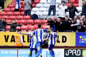 Scenes after Latics snatched victory