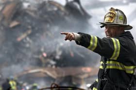 A firefighter is seen in the aftermath of the World Trade Centre attacks on September 11, 2001