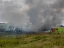The huge cloud of smoke was caused by burning tyres