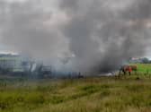 The huge cloud of smoke was caused by burning tyres