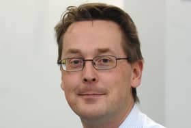 Dr Tim Dalton