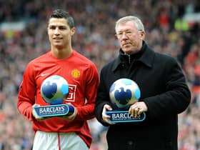 Manchester United's Alex Ferguson and Cristiano Ronaldo receive their manager and player of the month trophies in 2008