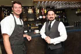 New owner chef Chris Crowell, left, with assistant manager Brandon Monk, right.