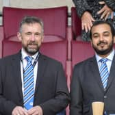 Talal al Hammad, right, with chief executive Mal Brannigan at the DW Stadium